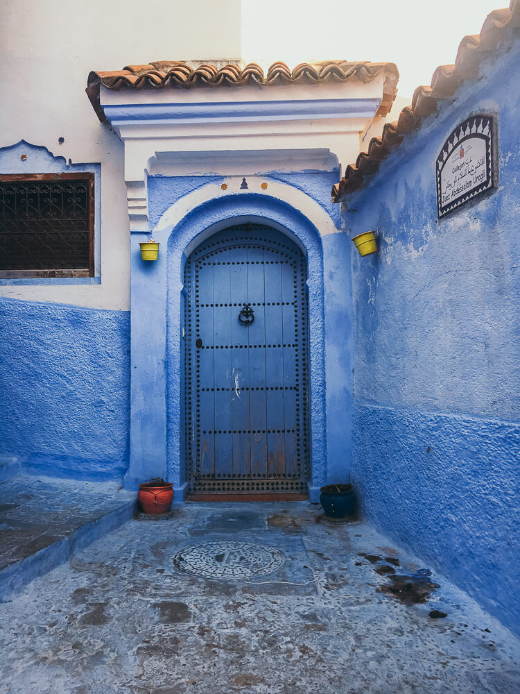 Blue door of the blue city in Morocco