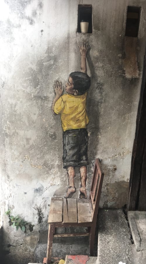 Boy On Chair Mural in Georgetown Penang